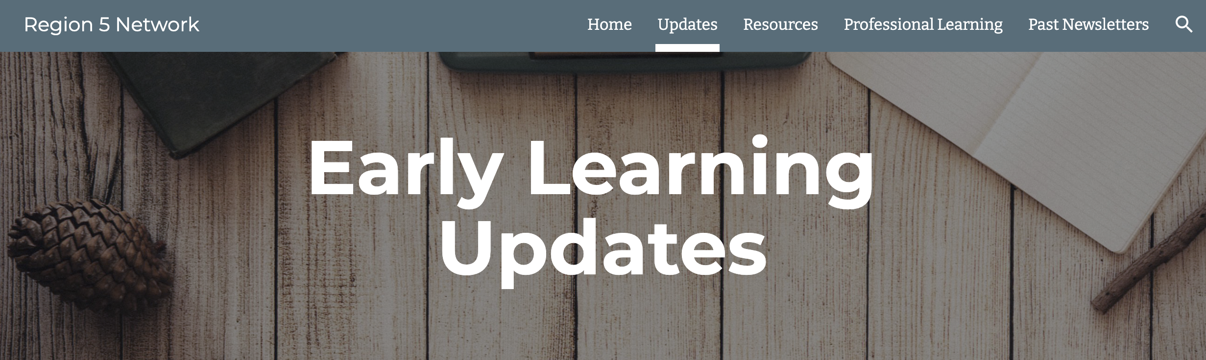 Site link with whitewashed boards, a pinecone on the bottom left, and a notebook on the right. 